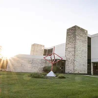 Henderson north west facade with sunrise behind