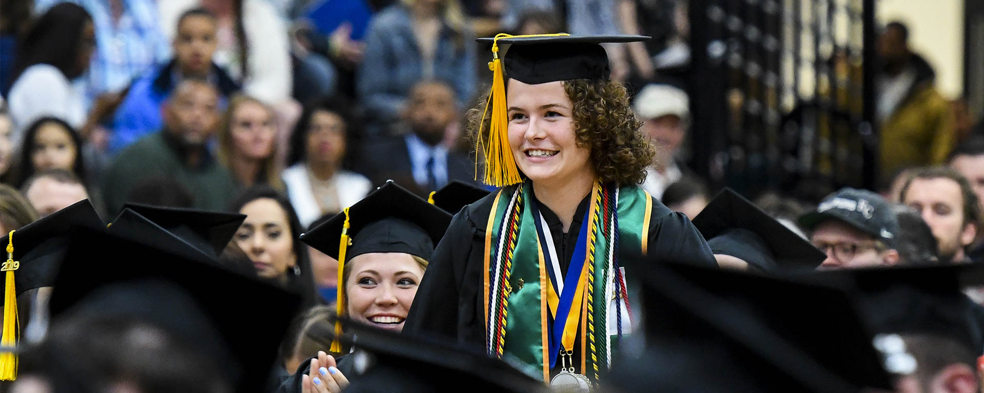 A Sibberson award winner is recognized during a graduation ceremony.