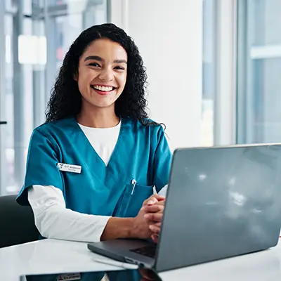 Dosimetry student at a computer.