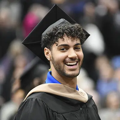 A business student at graduation