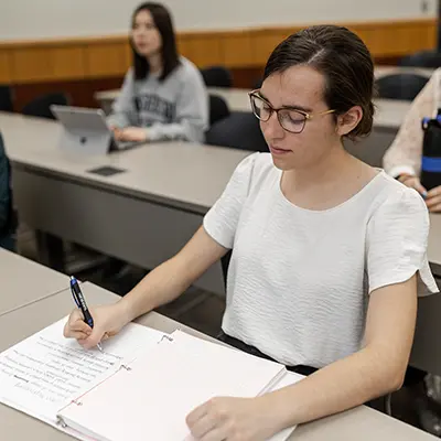 Student looking at financial documents