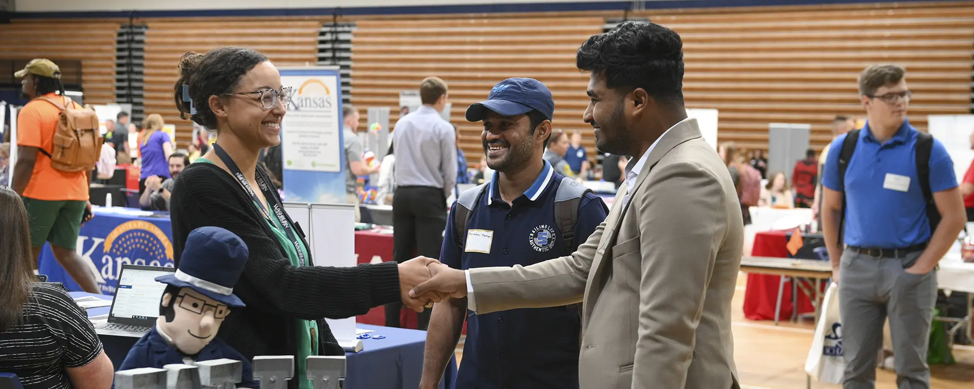 Students talk to prospective employers at the Career Fair.