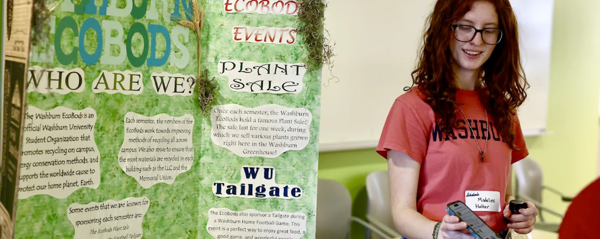 A student talks about the Ecobods club at biology night.