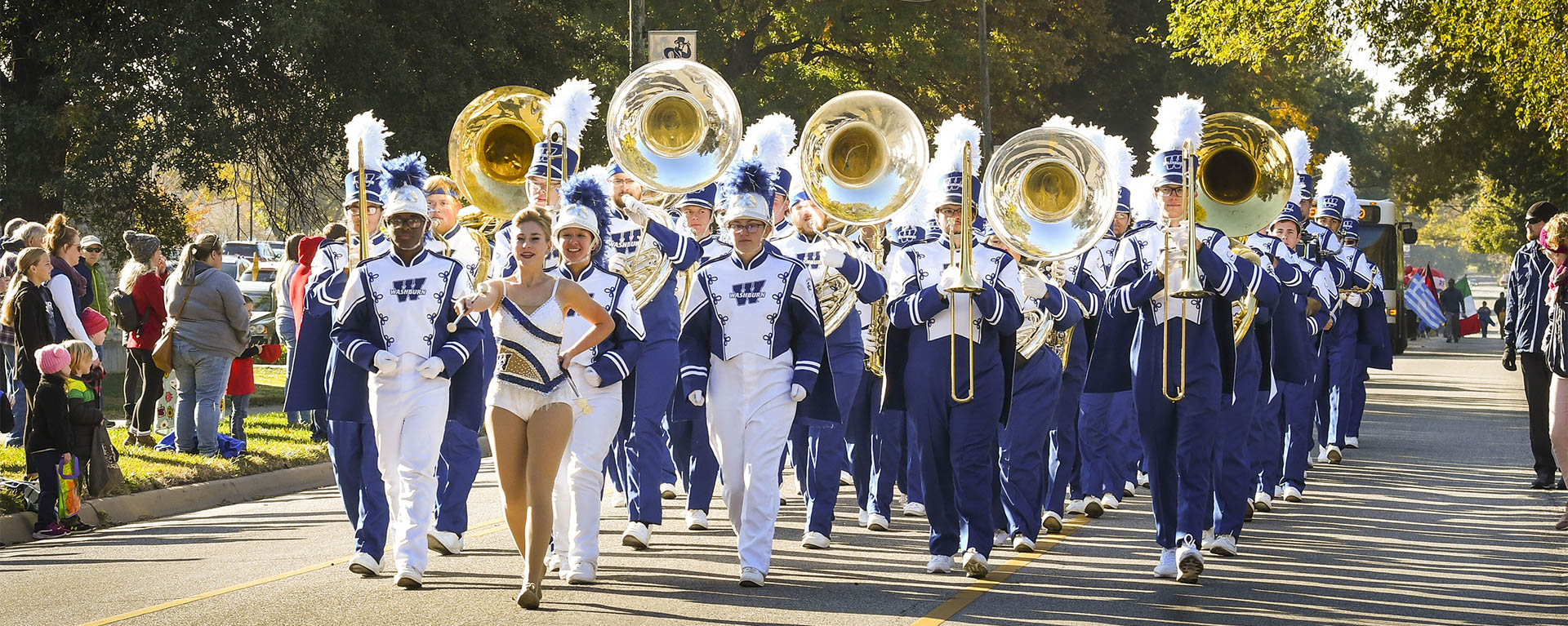The Marching Band performs during the Homecoming parade.