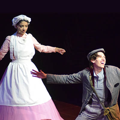 Two Theatre students during a performace