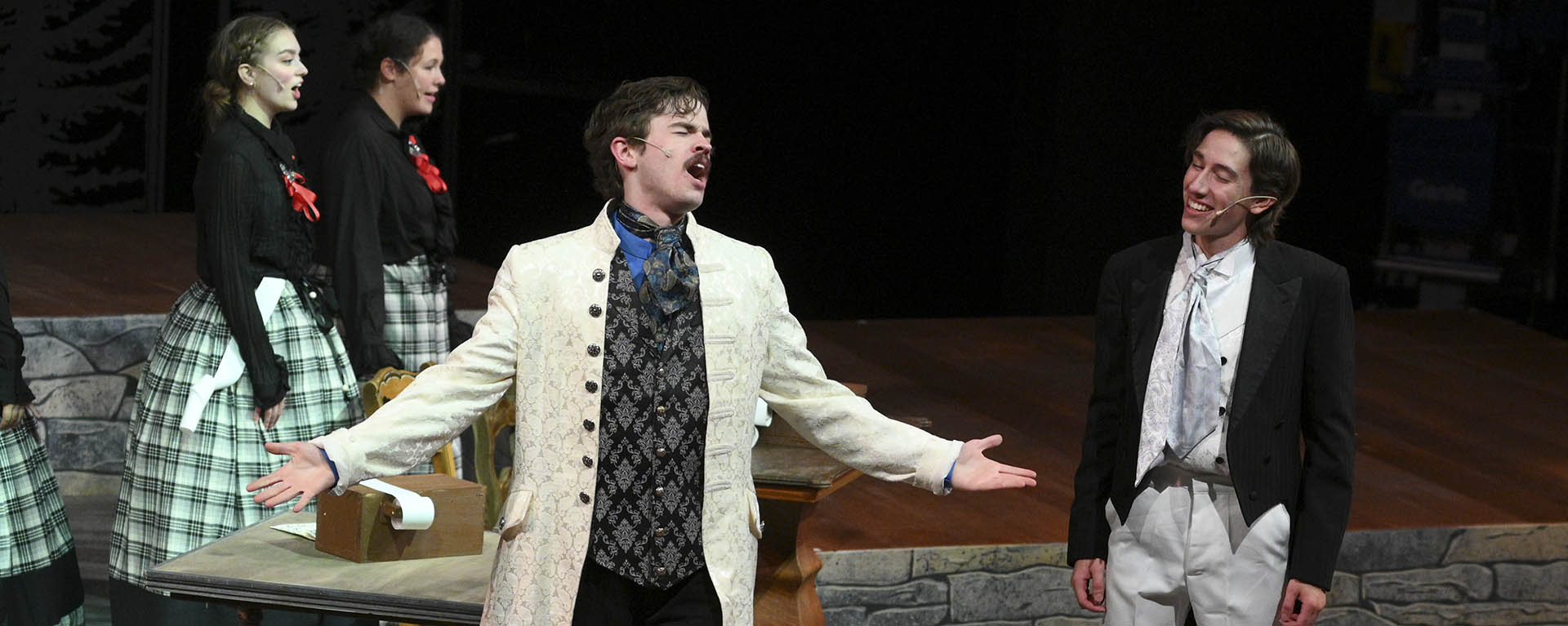 Students perform on stage during a Theatre production.