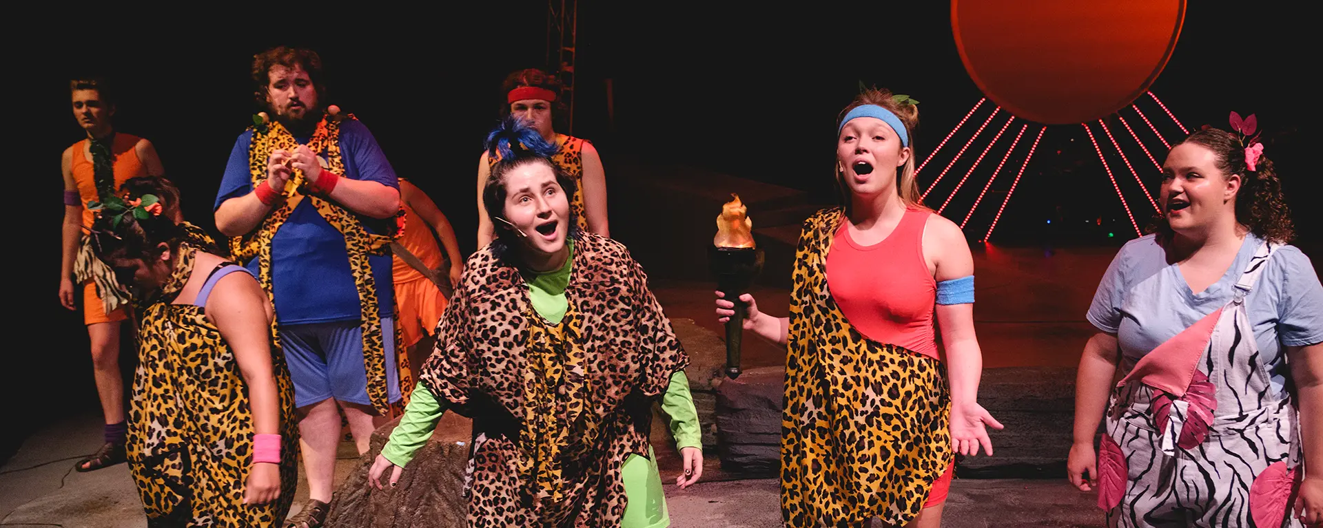 Students perform on stage during a Theatre production.