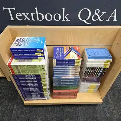 textbooks on shelves at the Ichabod Shop