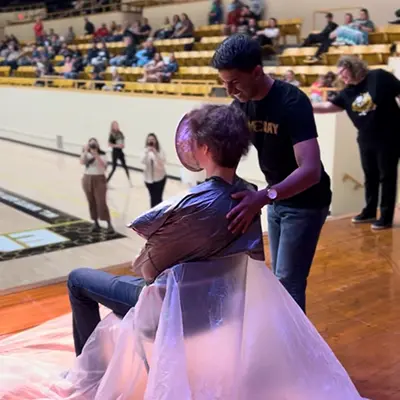 Last year's WSGA president is pied in the face on stage at ESU.