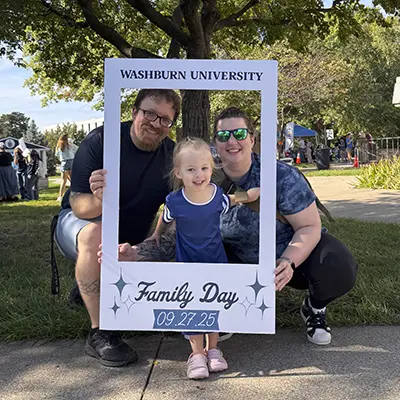A Washburn family poses for a photo.