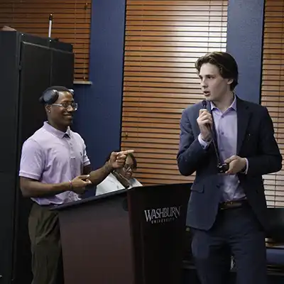 Student senators give a presentation.