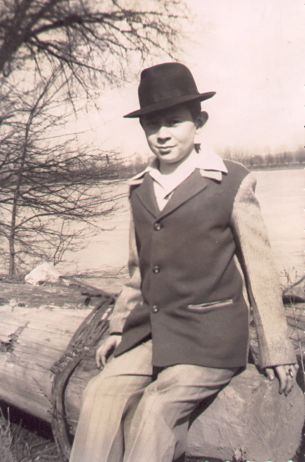 Max Yoho sits at the edge of the Missouri River